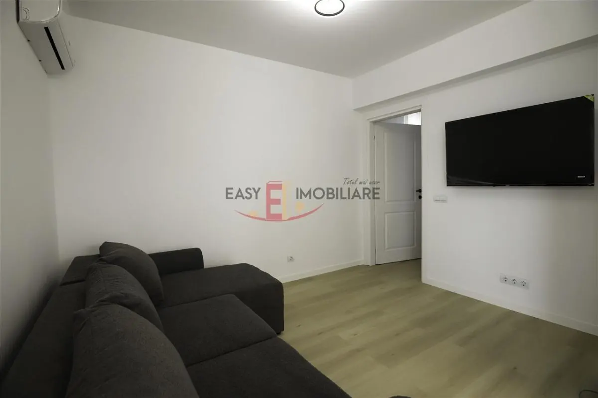 Apartament cu 2 camere Central, bloc nou et1, AC,Prima închiriere, parcare subterana - foto 1