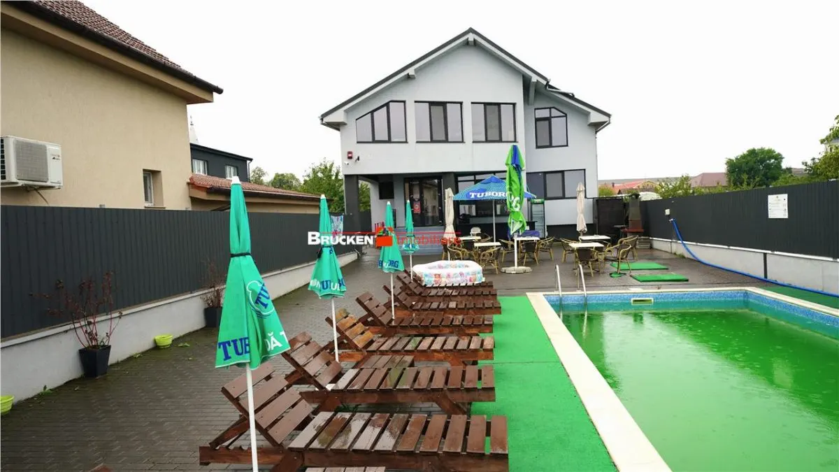 Cladire multifunctionala cu piscina â€“ inchiriere premium in centrul Sanmartinului - foto 1