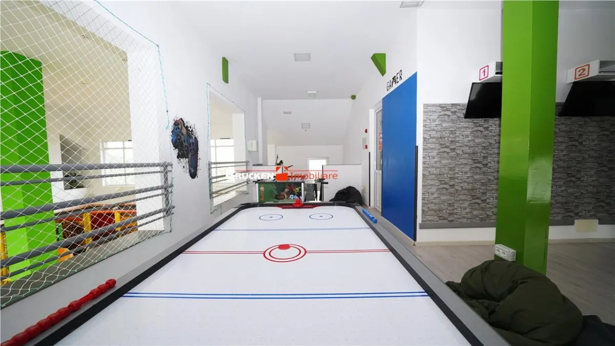 Cladire multifunctionala cu piscina â€“ inchiriere premium in centrul Sanmartinului - foto 12